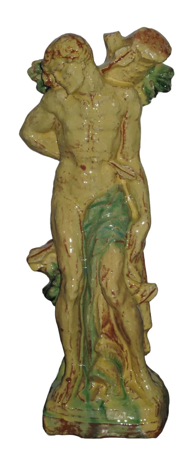 Heiliger Sebastian, an einen Baumstamm gebunden, gelb und grün glasierte Figur aus Irdenware.
